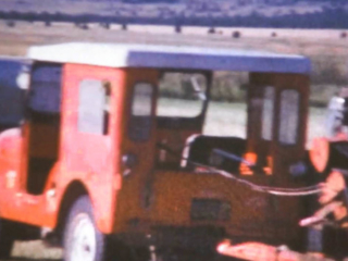 Rear view of a red Jeep