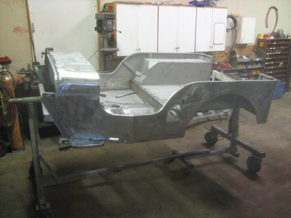 Original Jeep tub on a rotisserie during its 2007–2008 restoration.